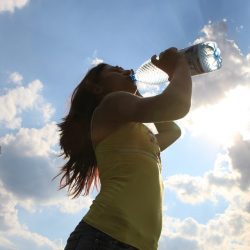 Girl drinking water from bottle