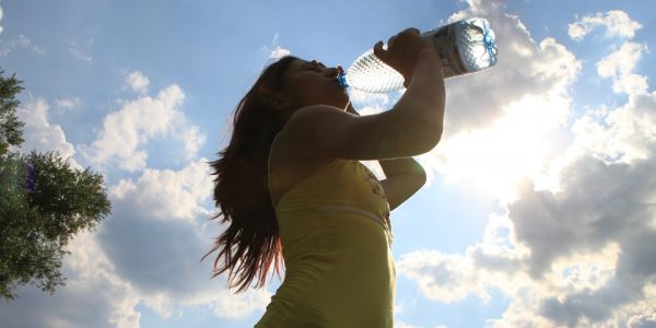 Girl drinking water from bottle